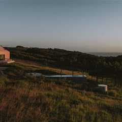 Every Side of This Pink House in Portugal Has a Patio