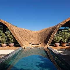 The Roof of This Brazilian Home Takes a Dip in the Pool