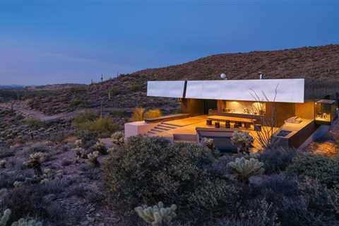 Topped With a Massive Metal Roof, a Futuristic Desert House Seeks $2.1M