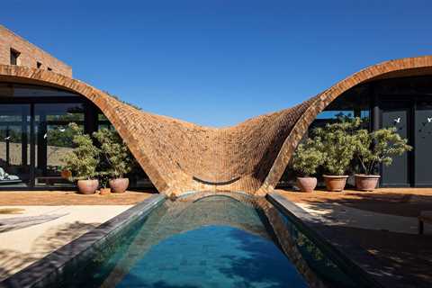 The Roof of This Brazilian Home Takes a Dip in the Pool
