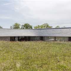 On the Latvian Coast, a Sea-Inspired Twist on the Gable Home