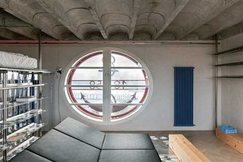 Steel Scaffolding Forms a Bed and Wardrobe in This Small Slovakia Apartment